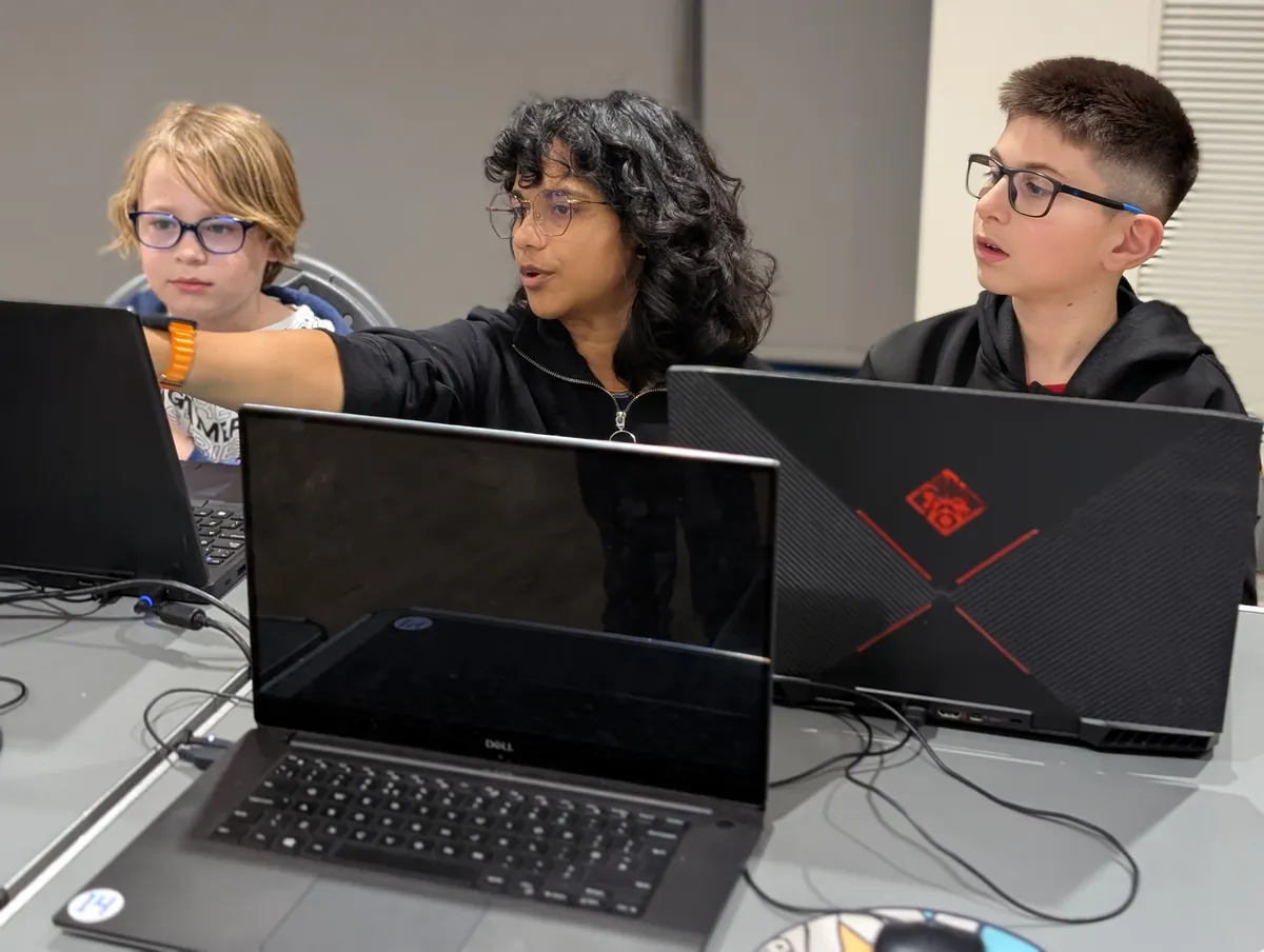 Mentor helping a child at Bishop's Stortford